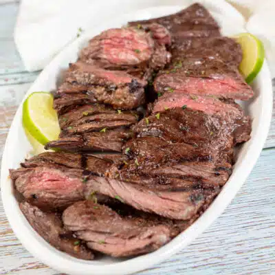 Square image of sliced grilled skirt steak.